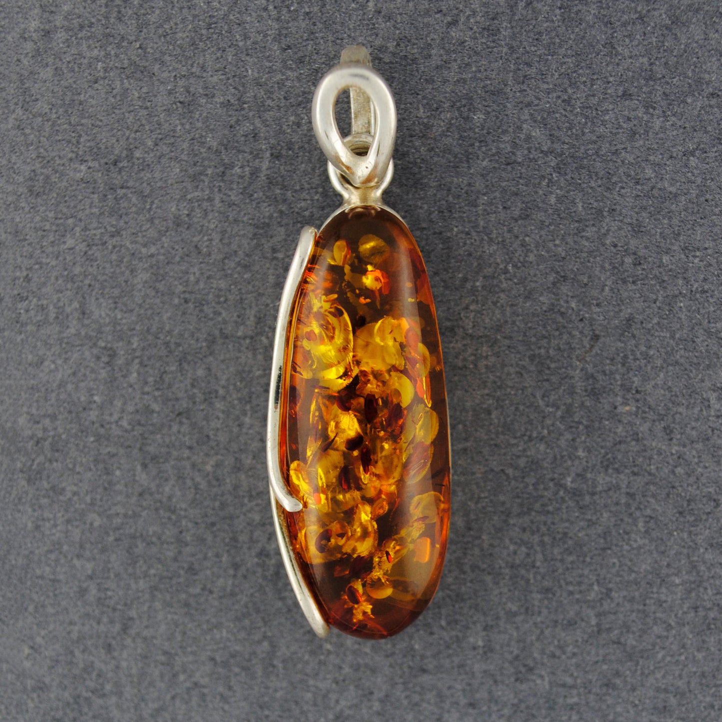 Amber Long Oval Wrap Border Pendant