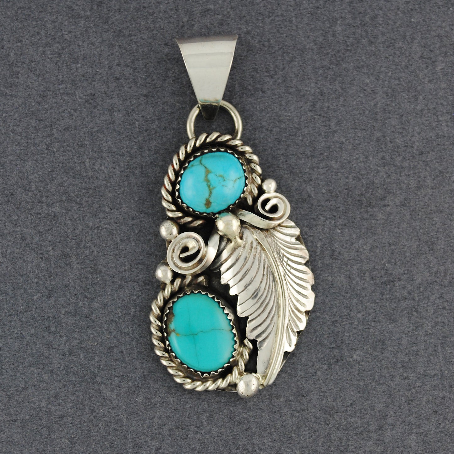 Sterling Silver Turquoise Ovals with Feather Pendant