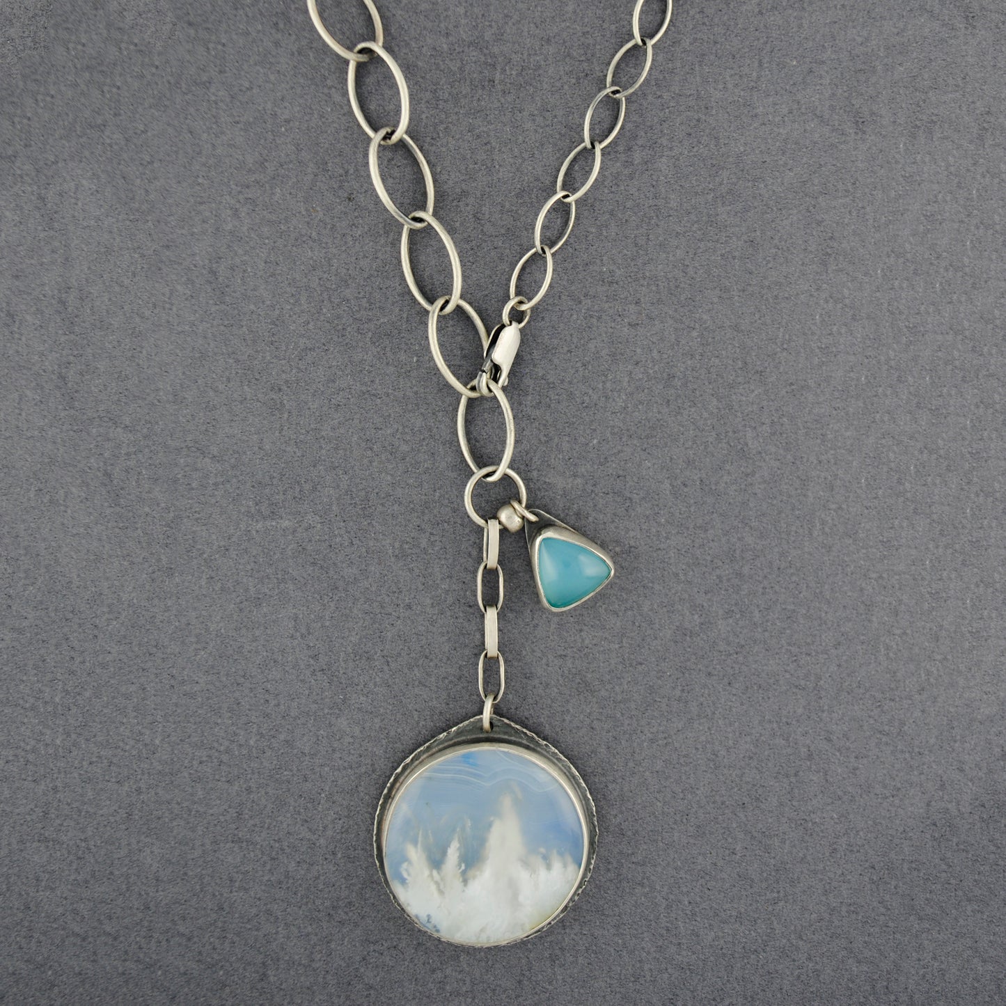 Mercury Orchid Amid The Clouds Plume Agate Necklace