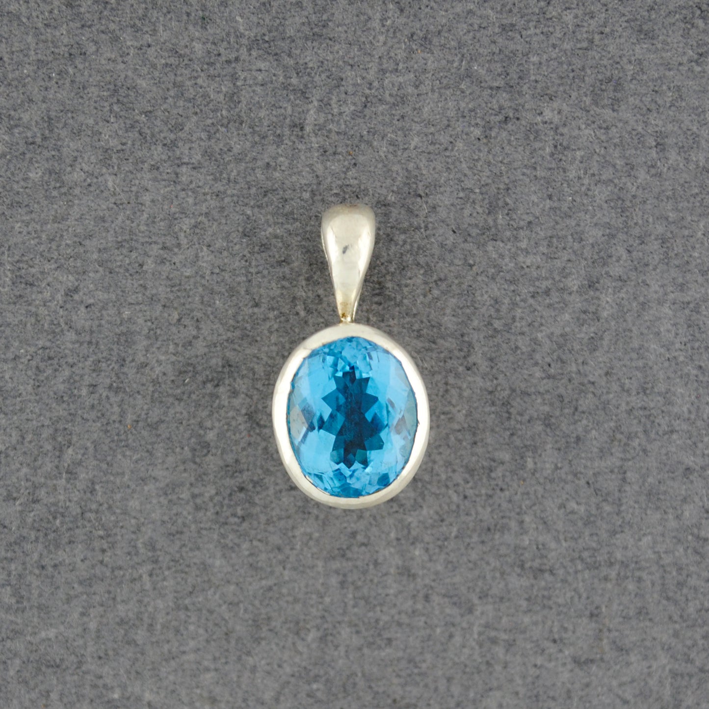 Sterling Silver Blue Topaz Oval Pendant