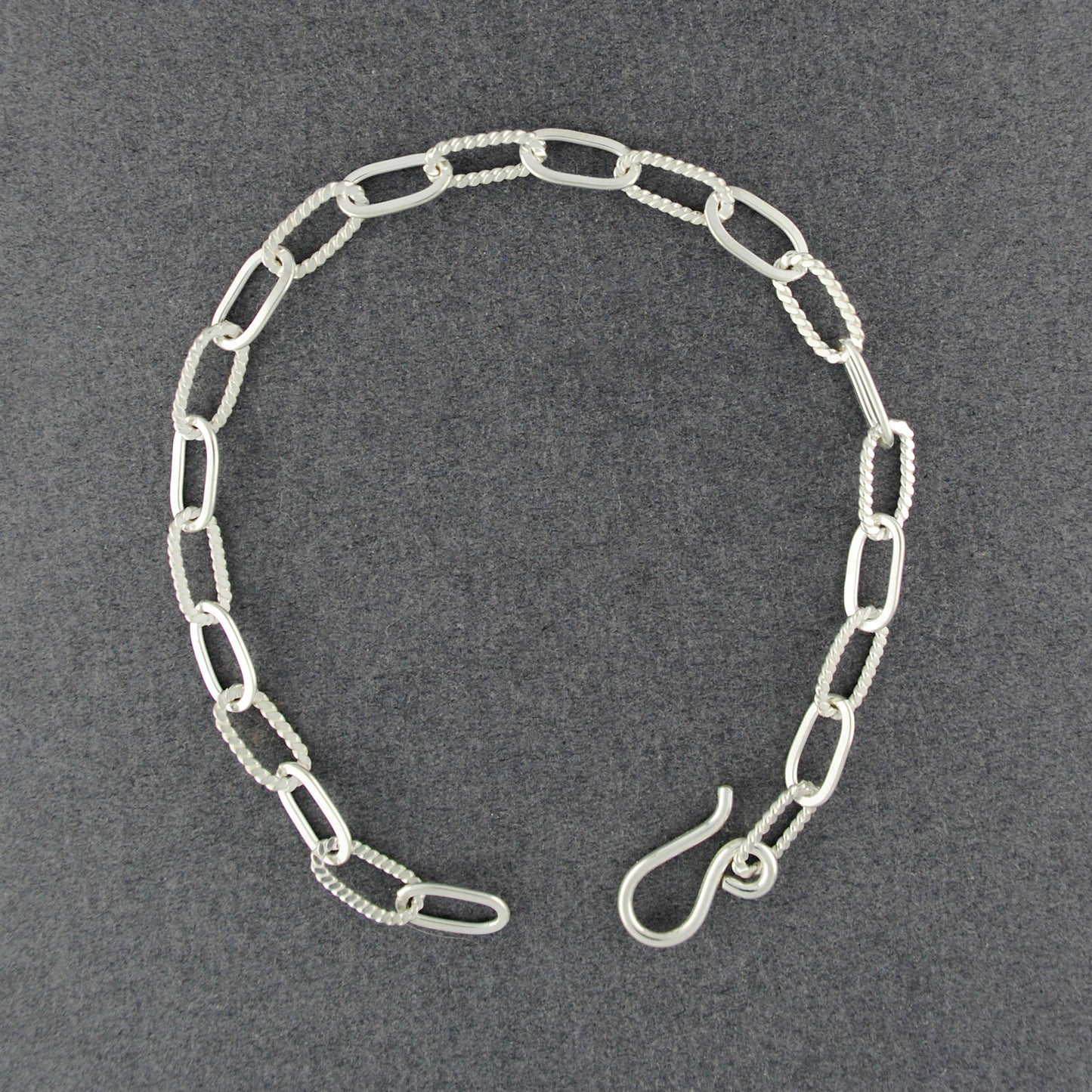 Sterling Silver Twist and Flat Ovals Bracelet