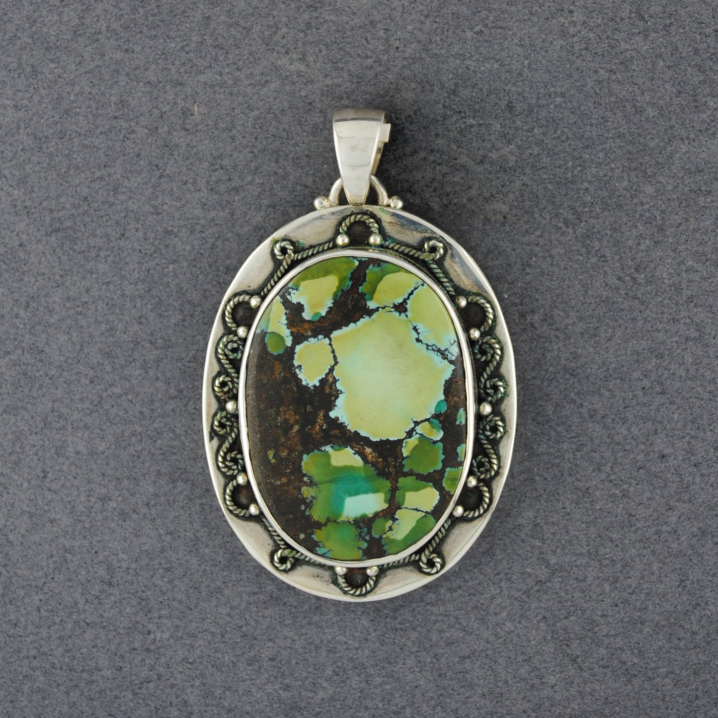 Sterling Silver Turquiose Swirl Frame Pendant