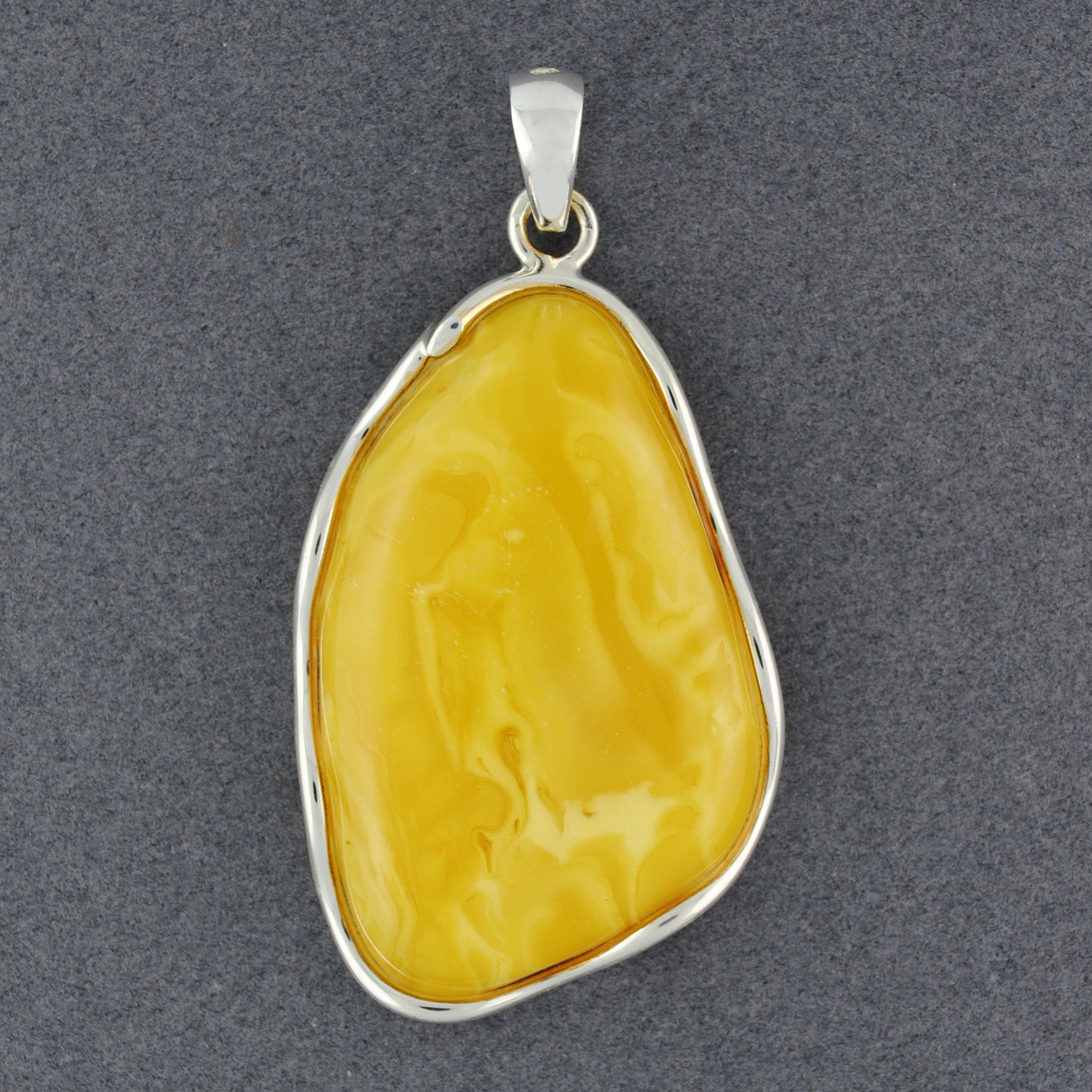 Butterscotch Amber  Wavy Triangle Pendant