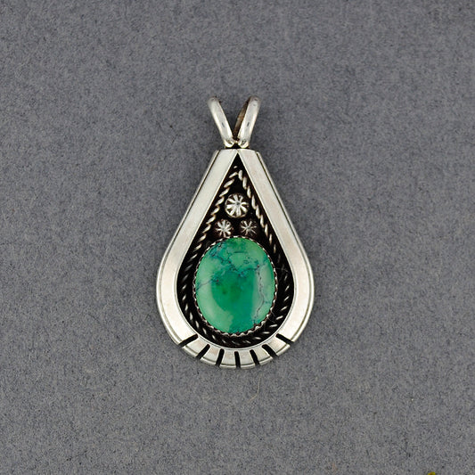 Sterling Silver Turquoise Oval In Detailed Teardrop Pendant