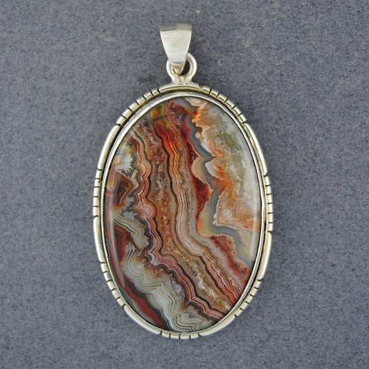 Sterling Silver Crazy Lace Agate Notched Oval Pendant