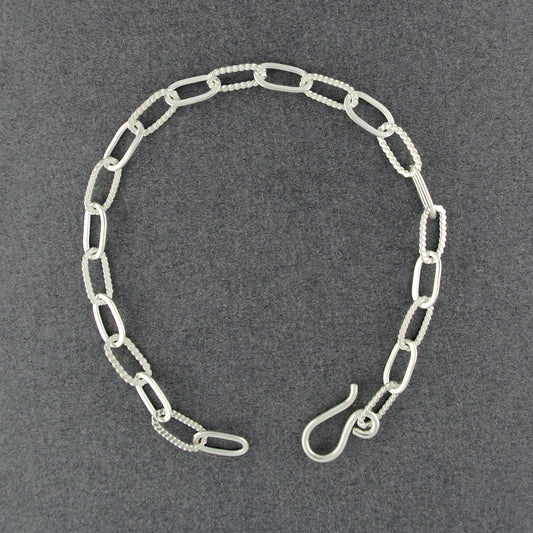 Sterling Silver Twist and Flat Ovals Bracelet