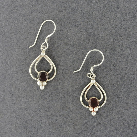 Sterling Silver Blue Topaz Faceted Oval Earrings