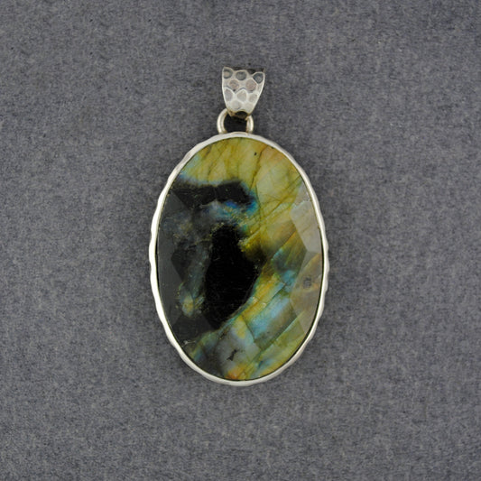 Sterling Silver Faceted Oval Labradorite with Hammered Border Pendant