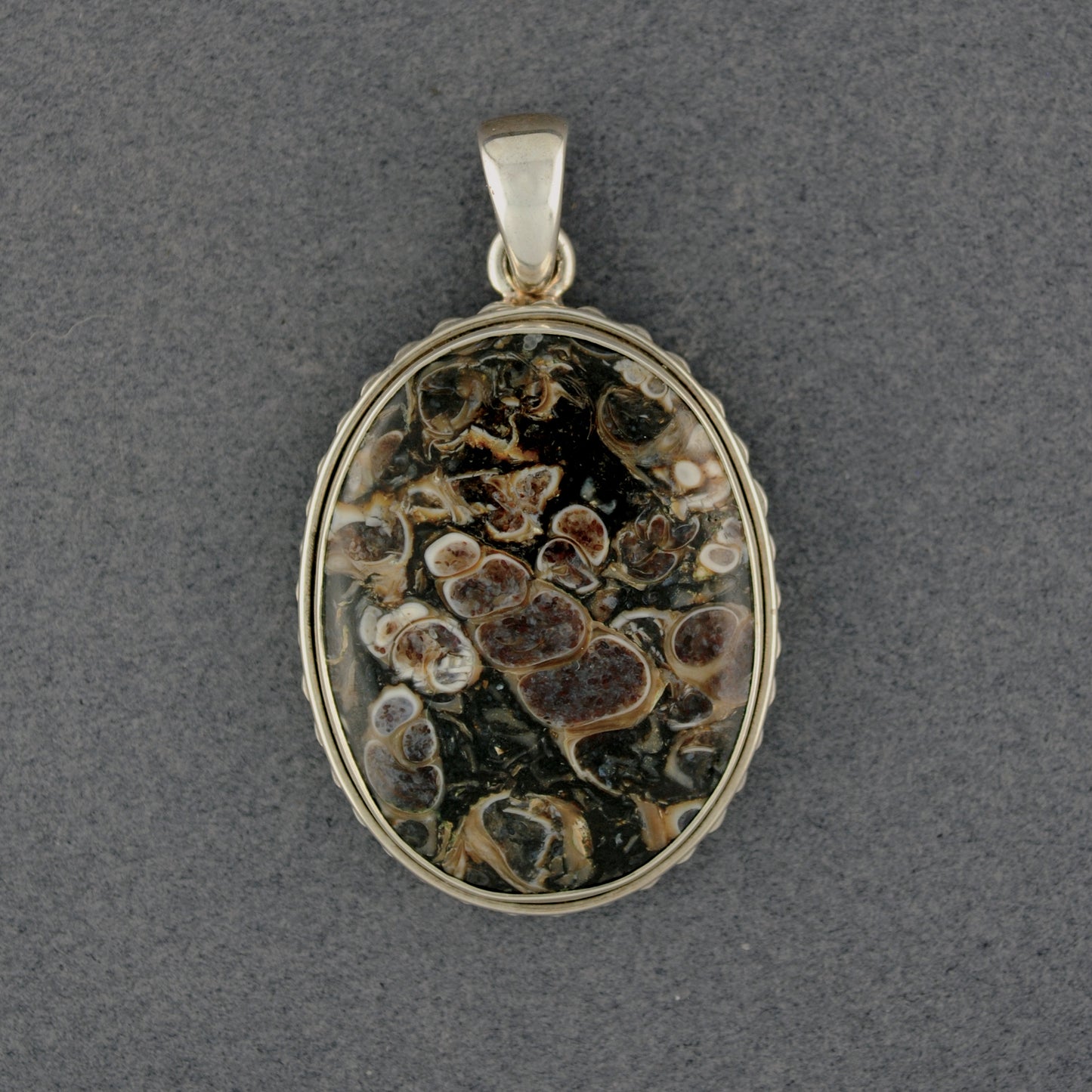 Sterling Silver Turretella Notched Oval Pendant